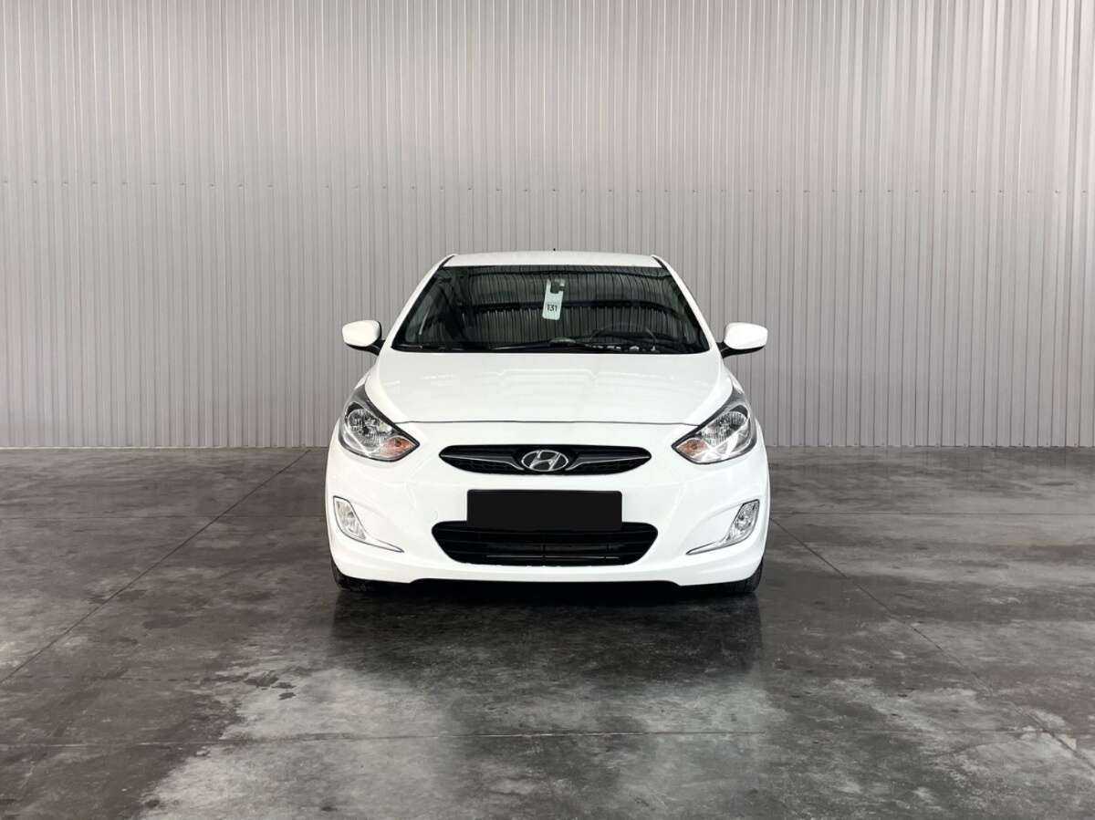 Купить Hyundai Solaris, 2013, 203 406 км.. Фото: #1